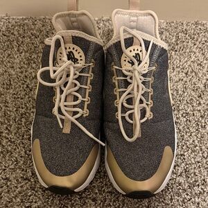 Nike Air Huarache Black and Gold Sneakers